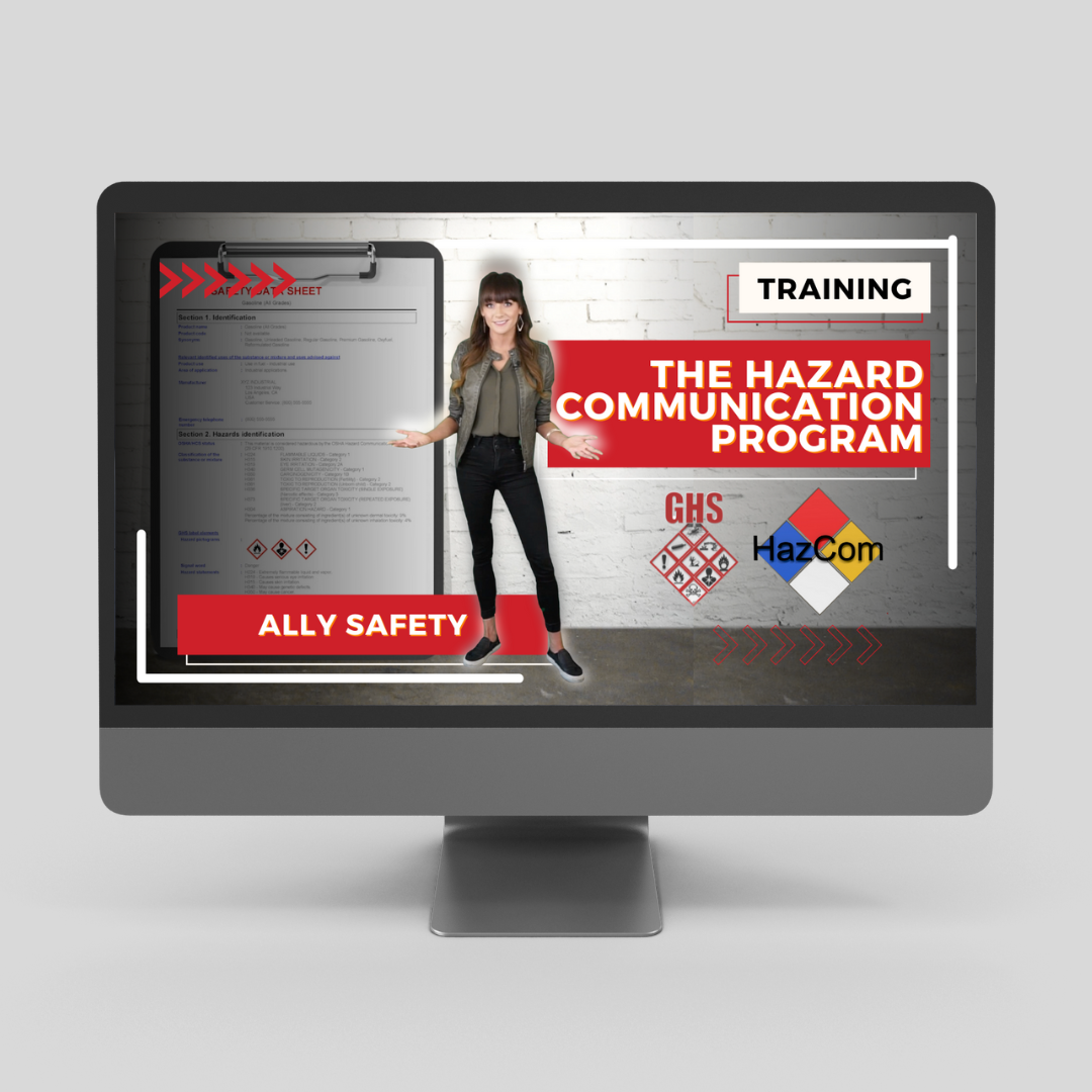 Diverse individuals in safety gear interacting with digital devices in a modern training environment.